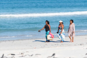Tourists walking at the beach in Diani